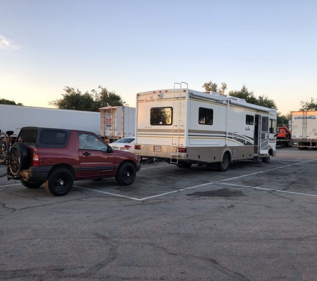 Bounder RV towing Chevy Tracker