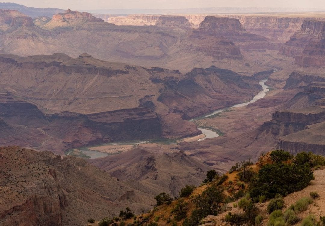 colorado river flowing at bottom of grand canyon