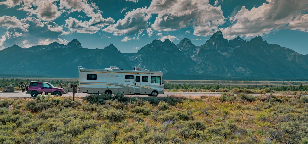 RV & Dinghy with backdrop of Grand Teton