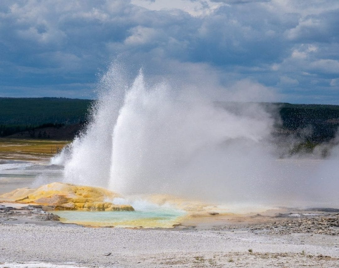 Eruption of Clepsydra Geyser in Lower Basin sends sulphur fumes and hot water several feet up in the air