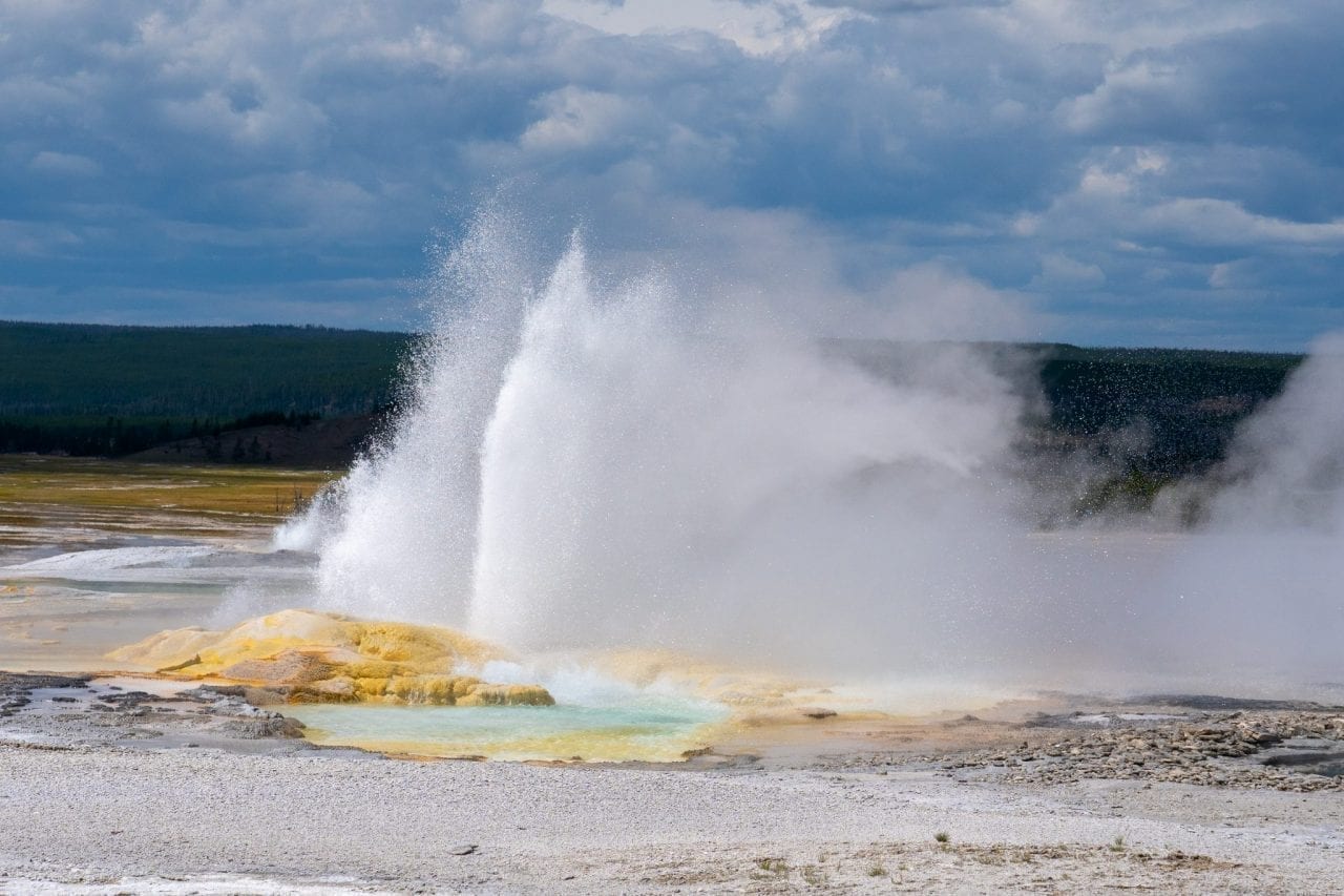 Eruption of Clepsydra Geyser in Lower Basin sends sulphur fumes and hot water several feet up in the air