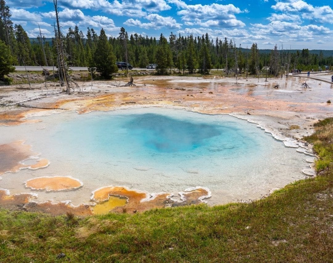 Silex Geyser, one of the first geysers we visited in Yellowstone in Lower Basin is this perfect combination of blue and orange! (Pin #5 in Yellowstone National Park Map above)