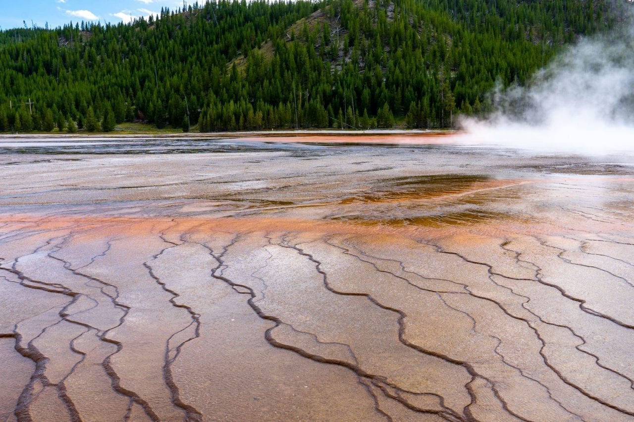 Vibrant orange layers surrounding Grand Prismatic Spring